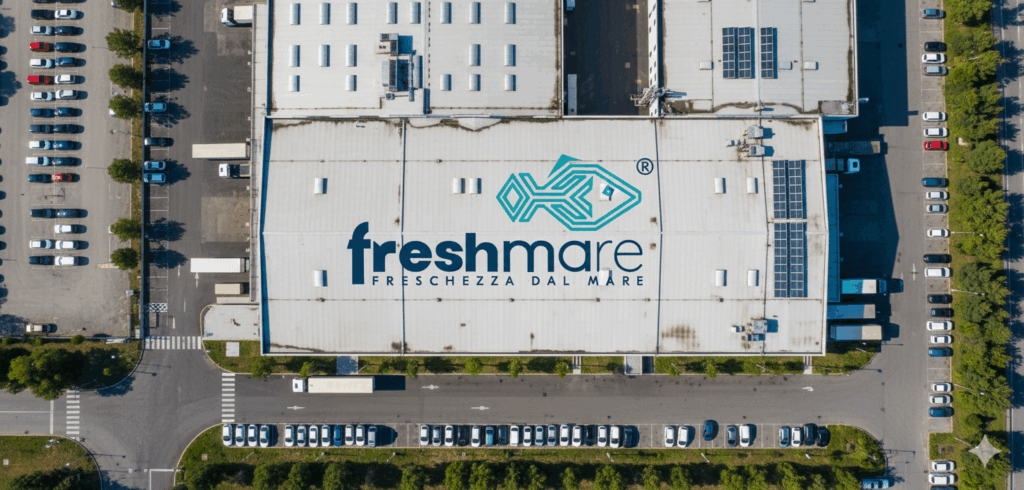 Overhead photo of the Freshmare logistics center with the brand logo visible on the roof